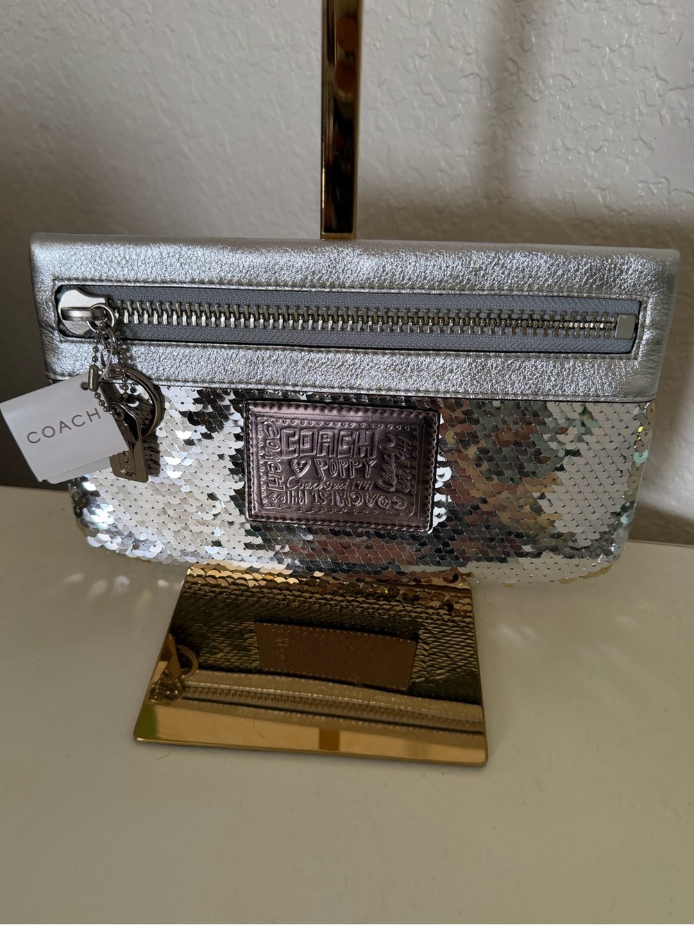 COACH Silver Poppy Sequin Wristlet Clutch with Metallic Trim